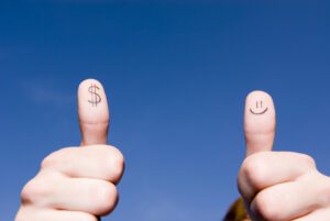 Two thumbs up smiley face and dollar sign